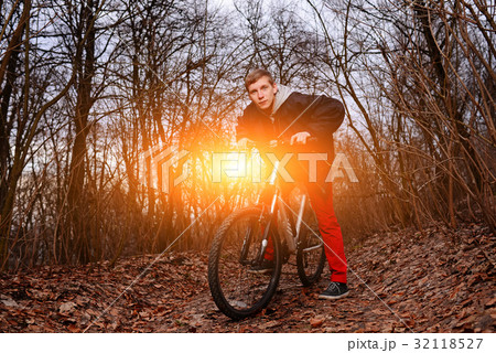 Cyclist Riding the Bike on the Trail 32118527