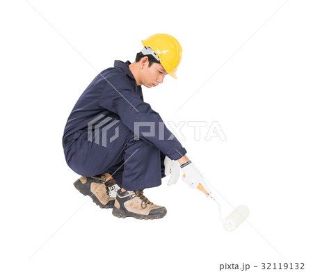 Worker using paint roller is painting invisible f Worker using paint roller is painting invisible f 32119132