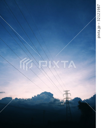 High voltage post with stormy clouds sky High voltage post with stormy clouds sky 32121987