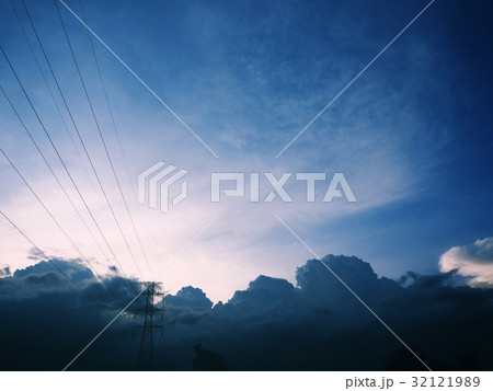 High voltage post with stormy clouds sky High voltage post with stormy clouds sky 32121989