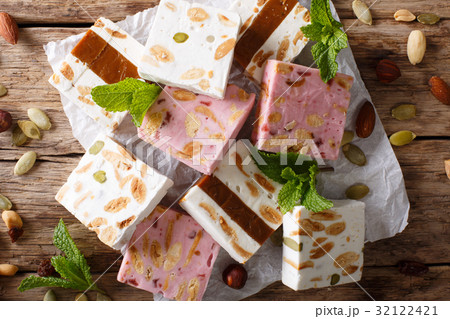French fresh nougat with nuts and pumpkin seeds French fresh nougat with nuts and pumpkin seeds 32122421