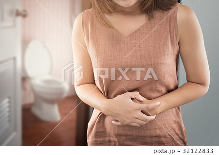 The woman wake up for go to restroom. People with diarrhea probl 32122833