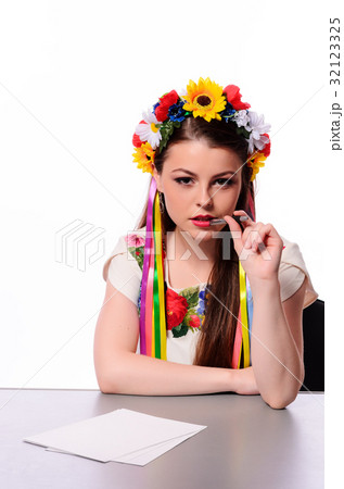 Happy businesswoman with note and pen Happy businesswoman with note and pen 32123325