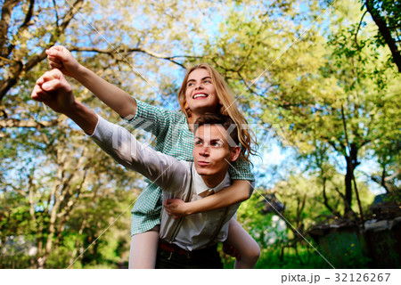 couple raising their hands in open air 32126267