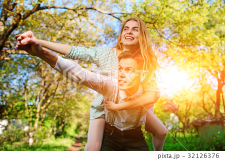 couple raising their hands in open air 32126376