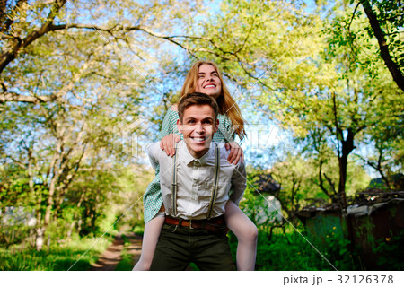 couple raising their hands in open air couple raising their hands in open air 32126378