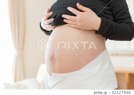 woman during pregnancy or shortly after childbirth 32127930
