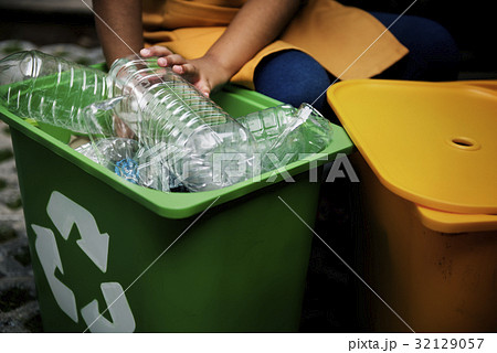 African Descent Kid Separating Recyclable Trash 32129057