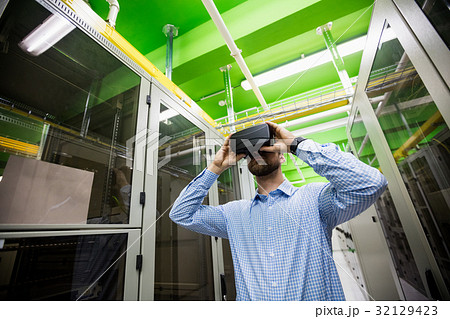 Technician using virtual reality headset 32129423