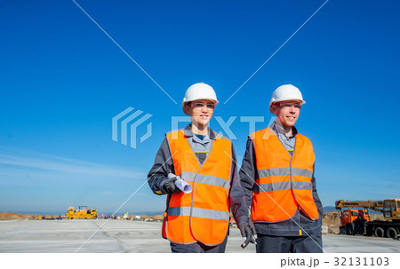 two engineers at airport runway 32131103