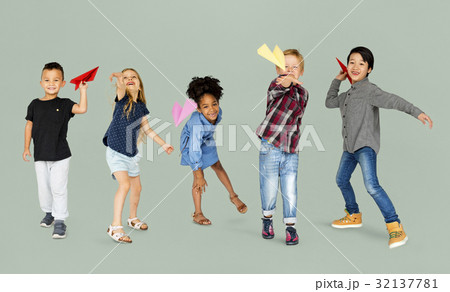 Diverse Group Of Kids Launching Paper Plane 32137781