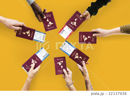 Group of hands holding passport in aerial view 32137836