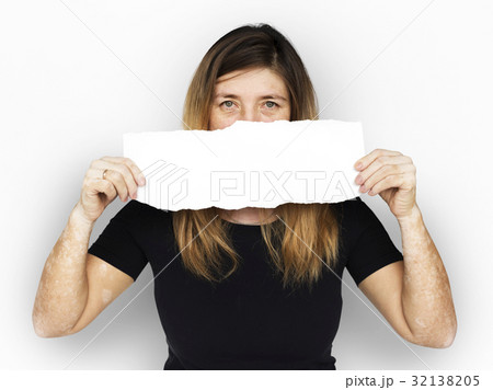Adult Woman Holding Blank Paper Covered Face Studio Portrait Adult Woman Holding Blank Paper Covered Face Studio Portrait 32138205