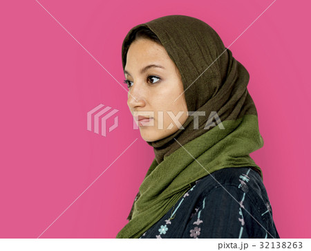 Middle eastern woman casual studio portrait Middle eastern woman casual studio portrait 32138263