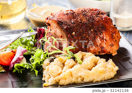 Pork knuckle with fried sauerkraut 32142136
