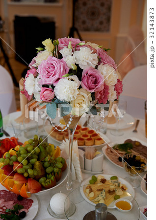 wedding arrangement in a tall glass in white and wedding arrangement in a tall glass in white and 32143873