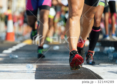 Marathon running race,drinks station at a marathon Marathon running race,drinks station at a marathon 32144289