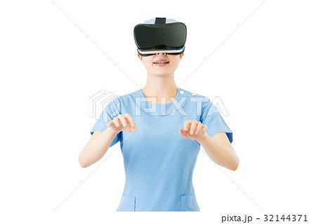asian female surgeon typing keyboard by VR headset asian female surgeon typing keyboard by VR headset 32144371