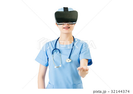 woman surgeon presenting with VR headset glasses woman surgeon presenting with VR headset glasses 32144374