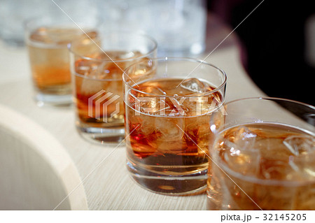 Glasses with whiskey 32145205