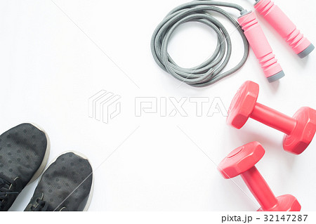 Flat lay of sport and fitness equipments on white  32147287