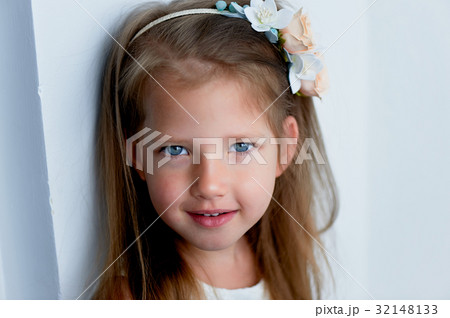 Charming girl with long ash-blond hair , lively Charming girl with long ash-blond hair , lively 32148133