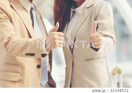 Happy successful business people showing thumb up Happy successful business people showing thumb up 32148521