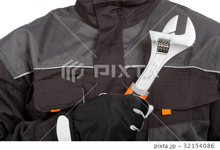Mechanic with a wrench 32154086