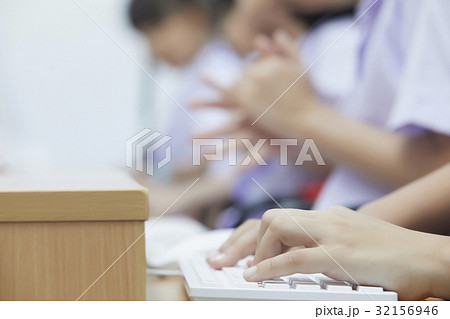 students are typing on keyboard in the computer lesson students are typing on keyboard in the computer lesson 32156946