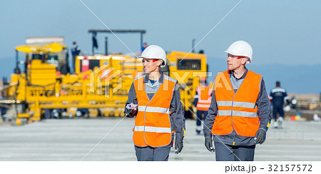 two engineers at airport runway two engineers at airport runway 32157572