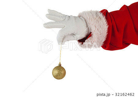 Santa claus holding christmas bauble Santa claus holding christmas bauble 32162462