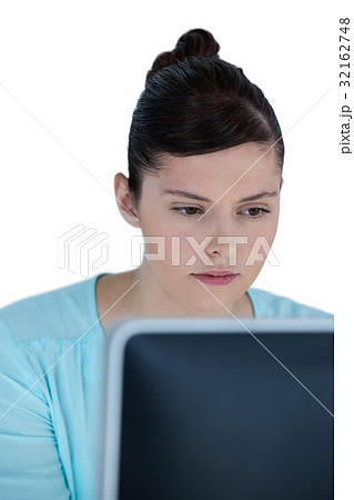 Businesswoman working over computer Businesswoman working over computer 32162748