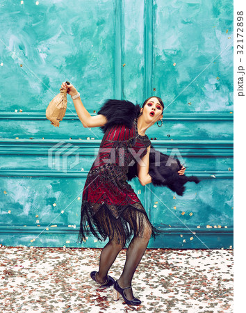 The studio shot of woman as retro dancer 32172898