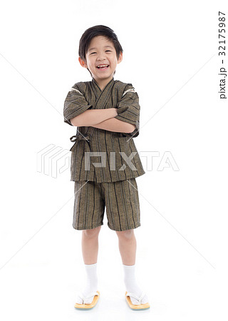 Happy asian boy in kimono on white background 32175987