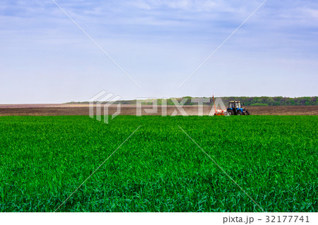 Field treatment by tractor Field treatment by tractor 32177741
