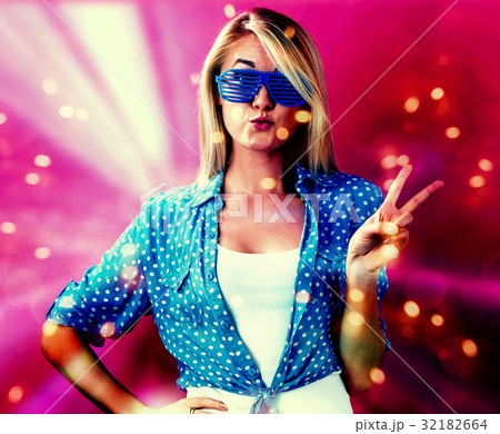 Young woman wearing shutter shades sunglasses 32182664