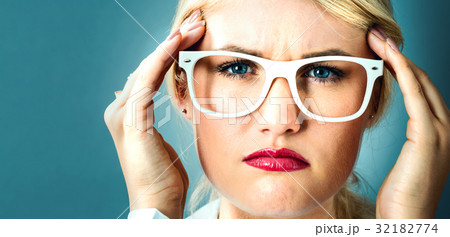 Young woman feeling stressed Young woman feeling stressed 32182774