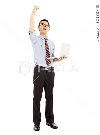 computer engineer is  standing and raise his hand 32183749