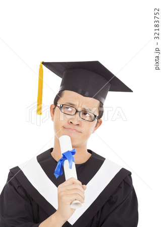 Thoughtful graduation man looking up 32183752
