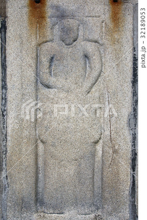 Old tombstone worn over time 32189053