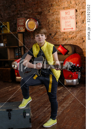 Boy in loft music studio Boy in loft music studio 32192302