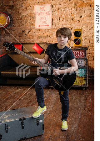 Boy in loft music studio Boy in loft music studio 32192303