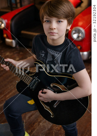 Boy in loft music studio Boy in loft music studio 32192304