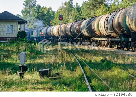 Freight train with tank wagons Freight train with tank wagons 32194530