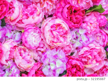 Beautiful background of artificial pink peonies.  32195887