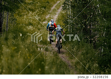 men cyclist on bicycles 32208156