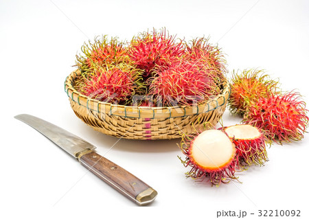 fresh tropical rambutan fruits over basket  32210092