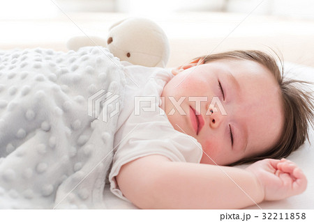 Little baby boy sleeping 32211858