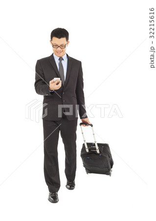 businessman walking and using phone   32215616