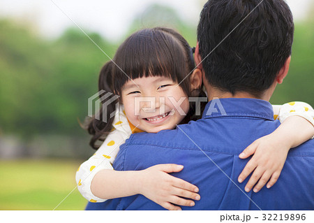 happy little girl hugging embracing her father 32219896